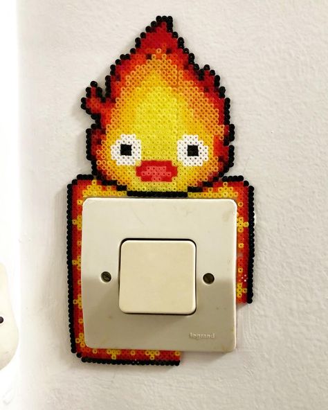 Creative Perler Bead Ideas, Hama Beads Room Decor, Calcifer Perler Beads, Perler Beads Room Decor, Perler Light Switch Cover, Perler Bead Light Switch Frames, Perler Decor, Calcifer Pixel Art, Pikachu Perler Beads