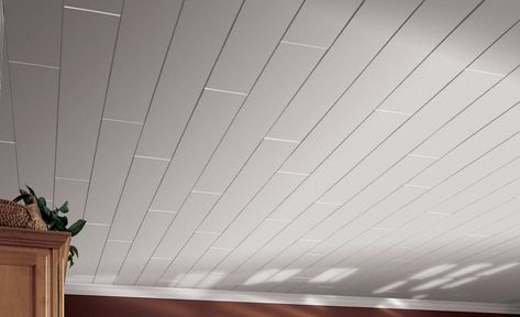 Armstrong Ceilings makes ceiling planks and tiles that can be installed directly over an old popcorn or drop ceiling in just a weekend. Ceiling Planks, Wood Plank Ceiling, Neutral Flooring, Armstrong Ceiling, Plank Ceiling, Drop Ceiling, Popcorn Ceiling, Plafond Design, Refinishing Floors