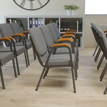 Give your event venue, worship center, or lecture hall a fresh new look with this commercial-grade stacking church chair. Durable gray fabric upholstery paired with a beautiful silver veined frame will lend an understated elegance to any space. The addition of wood accented arms relieves pressure from the neck and shoulders for a more comfortable seating experience. These extra wide 21" event chairs not only look stylish in your space but provide safe and secure seating. 15 gauge cold rolled ste Stacking Wood, Lecture Hall, Wood Accent, Stackable Chairs, Gray Fabric, Nesting Tables, Wood Accents, Furniture Manufacturers, Extra Seating