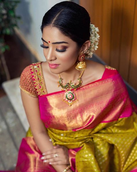 South Indian bride. Indian bridal jewelry. Jhumkis.Pink silk kanchipuram sari. Braid with fresh flowers. Tamil bride. Telugu bride. Kannada bride. Hindu bride. Malayalee bride.Kerala bride.South Indian wedding. Pinterest: @deepa8 Pendant Designs, Indian Bridal Sarees, Pattu Saree Blouse Designs, Wedding Saree Blouse, Saree Jewellery, Wedding Saree Blouse Designs, Silk Saree Blouse Designs, Wedding Silk Saree, Designer Saree Blouse Patterns