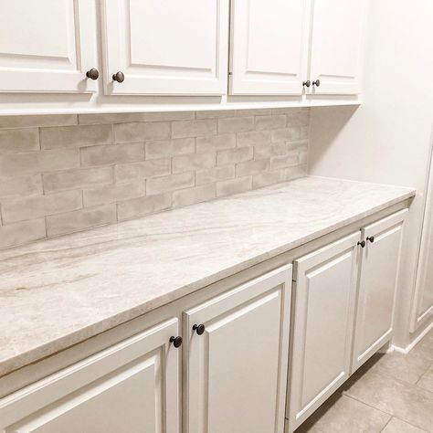 New year, new month, new week! It’s a blank slate just like this laundry room that received new Taj Mahal quartzite countertops and a… | Instagram Kitchen Glazed Tiles, Shadow White Quartz Countertops, Backsplash With Quartzite Countertop, Taj Mahal Quartzite Countertops With Subway Tile Backsplash, Backsplash For Taj Mahal Quartzite Countertops, Quartz Countertops With Tile Backsplash, Backsplash With Taj Mahal Countertops, Beige Quartzite Countertops, Light Stone Countertops