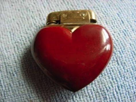 Solution: Heart-shaped lighter! I'll bring the gasoline! | 8 Valentine's Day Gifts For Taylor Swift Vintage Lunch, Cool Lighters, Antique Vintage Jewelry, Pez Dispensers, Worlds Fair, Furniture Antique, My Funny Valentine, I'm With The Band, Antique Store