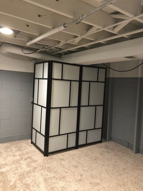 RISOR IKEA room divider hiding well pressure tank and sump pump Dividing Basement Space, Ikea Risor Room Divider, Drop Cloth Room Divider Basement, Room Divider Hack, Sump Pump Closet Basements, Risor Room Divider, Aquarium Divider Room Dividers, Well Pressure Tank, Ikea Room