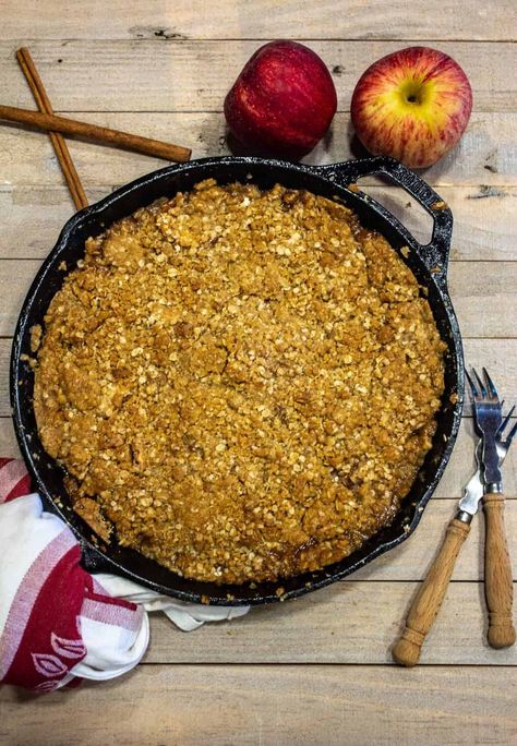 Skillet Apple Crisp is an old fashioned apple dessert made with orchard fresh apples and topped with an oatmeal and brown sugar crumble. Apple Crisp In A Cast Iron Skillet, Apple Crisp Syrup, Apple Crisp Betty Crocker, Apple Crumble In Cast Iron Skillet, Cast Iron Skillet Apple Crisp, Skillet Apple Crisp, Apple Sweets, Apple Crisp Dessert, Apple Brown Betty