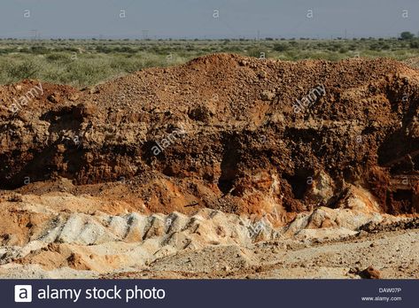 Download this stock image: Excavation of top soil down to the layer of first deposit of alluvial rock filled with diamonds, Barkly West,South Africa - DAW07P from Alamy's library of millions of high resolution stock photos, illustrations and vectors. Soil Images, Soil Degradation, Layers Of Soil, Alluvial Soil, Major Soil Types In India Map, Alluvial Soil Image, Top Soil, South Africa, Soil