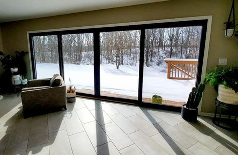 Black Sliding Patio Doors Open up Ada Living Room — Pella of Western Michigan Wood Patio Doors, Screen Porches, Backyard Goals, Door Projects, Sliding Glass Doors Patio, Fiberglass Windows, Glass Doors Patio, Sunroom Addition, Pella Windows