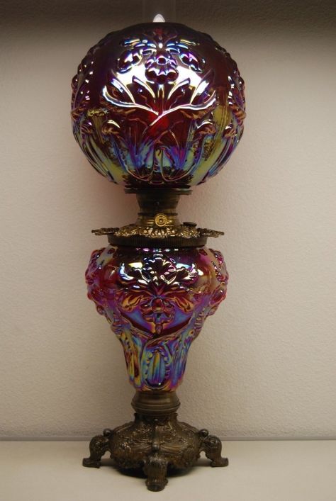 CARNIVAL GLASS FENTON Gwtw Iridescent Marygold Oil Kerosene Artnouveau Iris Lamp $10,500.00 - PicClick Iridescent Decor, Wine Bottle Tiki Torch, Rainbow Kitchen, The Epiphany, Carnival Glass Vintage, Carnival Glassware, Fenton Glassware, Victorian Lamps, Antique Oil Lamps