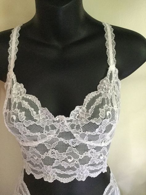 Delicate bridal white floral lace non-wired bralette and French knicker set Beautiful soft lace bralette .with lace and elastic two part adjustable straps. Available in a variety of cup sizes. Standard sizes are available as sets. 32/34 a to b 32/34 c to d 36/38 b to c 36/38 d to e My full size range is from 30 To 38 , Aa to F cup size. To choose from the full range please purchase your lingerie as separates , you can purchase the bralette here https://www.etsy.com/uk/fidditchdesigns/listing/457 White Lace Bralette, Cup Sizes, Cup Size, Lace Bralette, Festival Bra, Floral Lace, White Lace, Bralette, Crochet Top