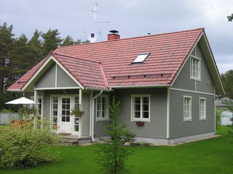 Grey wood house, exterior, squared windows, red roof Red Roof Gray House, Red Shingle Roof Exterior Colors, Red Roof Grey House, House Colors With Red Roof, Grey House With Red Roof, Exterior House Colors With Red Roof, Red Shingles House Colors, House Exterior Red Roof, Red Metal Roof Houses Color Combos