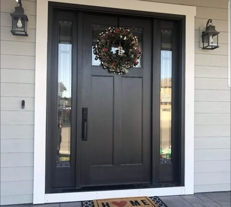 Black Front Door With Black Trim, Black Wooden Front Door, Front Door Ideas Black, Front Door With Black Trim, Black Front Door Log Cabin, Black Front Entry Doors With Sidelights, Pella Doors Front Entry Black, Exterior Front Door Ideas, Black Front Door Lowe's