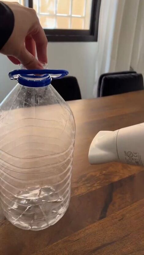 Im loving these organic shaped vases popping up everywhere. Every piece is so unique. And they seem DIYable! So heres how I made one! You'll need a large plastic bottle. I chose a 5 liter water bottle. You can choose smaller or bigger depending on the size of vase you want. Start heating the plastic bottle using a heating gun if you dont have a heating gun you can use a hair dryer on high heat like i did. As the bottle starts heating the plastic will start warping. Mold it any… Diy Large Vase How To Make, Textured Vase, Old Wall, Just Style, Bottle Vase, Plastic Bottle, Large Vase, Good Old, Plastic Bottles