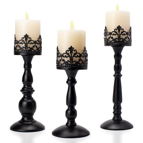 PRICES MAY VARY. Retro Design: Hollow crown candle holders can hold pillar candles and LED flameless Candles up to 3 inches. They are perfect table centerpieces and would adding a premium atmosphere to your home decor whether rustic farmhouse, modern, gothic or industrial. Smooth To The Touch: Iron candle stands adopt mature powder coating technology to make it rust-proof, smooth, without bumps, and can be kept for years and years Anti-scratch pad is attached to the bottom to protect your table. Candle Stands Decor, Gothic Candle Holder, Gothic Candle, Metal Candle Stand, Black Pillar Candles, Gothic Candles, Candle Table Centerpieces, Black Candle Holders, Candle Stands