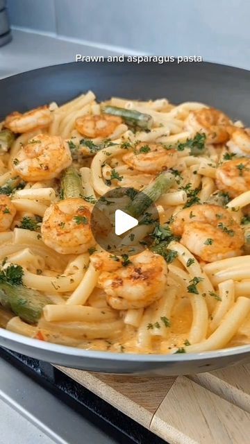 Barbara Bajon on Instagram: "Prawn and asparagus pasta 😋

Ingredients:
150g prawns
1 tsp Cajun seasoning
1 tbsp olive oil
1 tbsp butter
2 tbsp olive oil
1/2 onion, chopped
4 garlic cloves, minced
5 asparagus spears, chopped
1 red chili, chopped
1 tsp tomato paste
200ml double cream
1 tsp mixed herbs
1/2 tsp salt
1/4 cup pasta water
150g pasta
Fresh parsley or coriander, for garnish
3 tbsp Parmesan cheese, grated
Instructions:
Prepare the Prawns:

Mix prawns with Cajun seasoning and olive oil.
Fry prawns for 2 minutes on each side. Remove from pan and set aside.
Prepare the Sauce:

In the same pan, add butter and olive oil.
Sauté onions and garlic for 1-2 minutes until fragrant.
Add chopped asparagus and red chili, fry for 2 minutes.
Stir in tomato paste and half cup of pasta water. Cook u Sauté Onions, Pasta Homemade, Pasta Fresh, Garlic Prawns, Pasta Water, Asparagus Pasta, Double Cream, Pasta Ingredients, Garlic Pasta