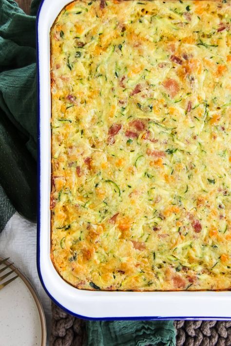 This Cheesy Ham Zucchini Bake is perfect for all occasions: breakfast, brunch, lunch, a snack, side dish or even a light dinner! Ready in under 1 hour. Zucchini Breakfast Casserole Recipes, Zucchini Breakfast Casserole, Zucchini Egg Casserole Recipes, Zucchini Egg Bake Breakfast, Zucchini Egg Casserole, Zucchini Ham Egg Bake, Ham Zucchini Casserole, Zucchini Brunch Recipes, Zucchini And Ham Recipes