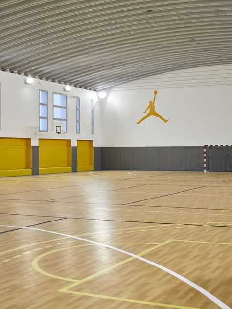 Gallery of Wall of Knowledge Middle School / Tarik Zoubdi Architect + Mounir Benchekroun Architect - 8 Hall Colour, School Building Design, Basketball Gym, Building Entrance, Indoor Basketball, Gym Interior, School Interior, Color Plan, Sport Hall