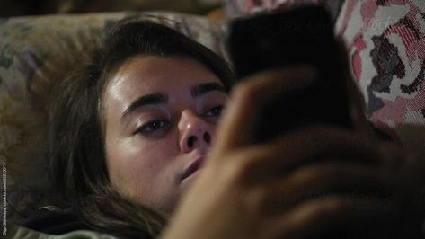 Woman screen time using phone laying in a bed Laying In Bed On Phone, On Phone In Bed, Dark Bedroom Ideas For Couples, Bed Cinema, Graphic Narrative, Bedrooms Ideas For Couples, Rat Aesthetic, Dark Bedrooms, Alone At Home