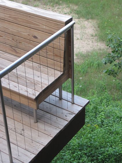 Take care to consider the board spacing and cable spacing together to avoid a cable’s landing in the joint between boards. Reling Design, Rustic Deck, Deck Railing Design, Modern Deck, Railings Outdoor, Cable Railing, House Deck, Pool Fence, Casa Exterior