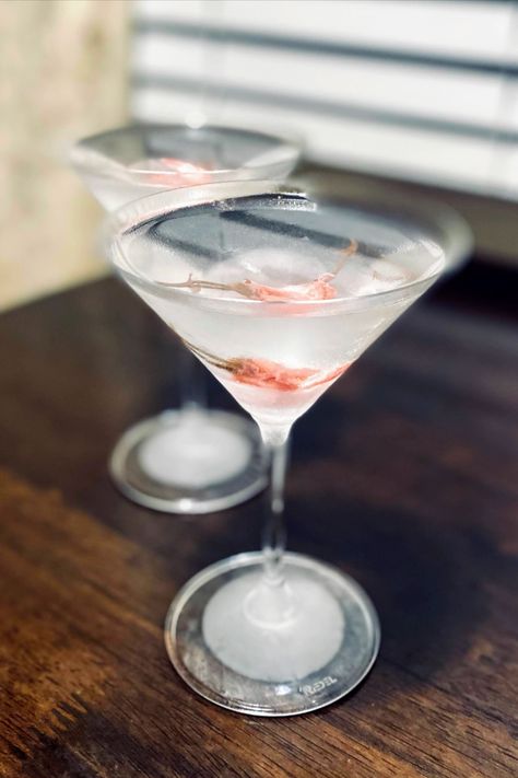 Celebrate Valentine's Day, or any day, with this delicate and flavorful Sakura Martini with Salted Cherry Blossoms. This martini is as delicious as it is elegant, with the perfect combination of gin, sake, and maraschino mixed with a savory bite of salted cherry blossoms. Treat yourself and try this fabulous cocktail! Sakura Cocktail, Roku Gin, Japanese Cocktails, Recipes Smoothies, Mums Birthday, Sunday Dinners, Easy Cocktail, Martini Recipe, Cherries Jubilee