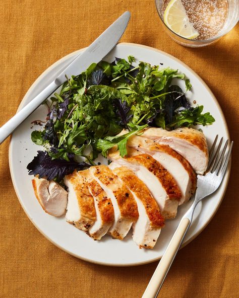 chicken breast prepared in a sous-vide, plated and sliced, and served with salad greens. A glass of seltzer with lemon in the upper right Sous Vide Chicken Breast, Sous Vide Chicken, Thyme Chicken, Sous Vide Cooking, Crustless Quiche, Breast Recipe, Quiche Recipes, Cooking Gadgets, Juicy Chicken