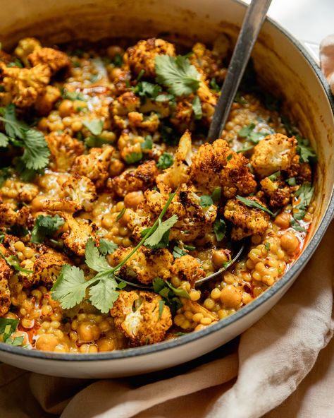 Coconut Couscous with Roasted Cauliflower & Chickpeas | The First Mess Coconut Couscous, Tofu Couscous, Roasted Cauliflower Chickpea, Gluten Free Orzo, Cauliflower Chickpea, Veggie Mains, Homemade Spice Blends, Tofu Dishes, Coconut Milk Curry