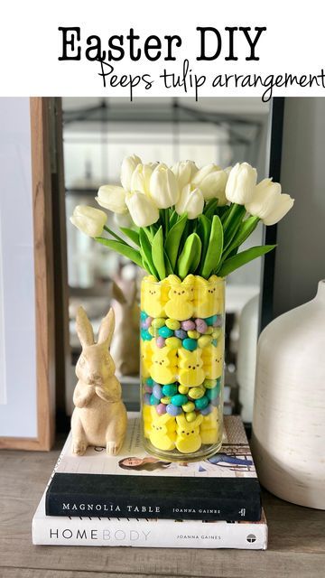 Courtney Hamilton on Instagram: "Quick and budget friendly Easter floral arrangement using Peeps, M&M eggs, & faux tulips. #tulips #centerpiece #easter #easterdecor #easteridea #centerpieceidea #tabledecor #easterdiy #spring #diydecor #homedecor #amazonhome #founditonamazon #targetstyle Follow my shop @athomewiththehamiltons on the @shop.LTK app to shop this post and get my exclusive app-only content! #liketkit #LTKSeasonal #LTKhome #LTKkids @shop.ltk https://liketk.it/42CaJ" Peeps Centerpiece Easter, Tulip Arrangements Ideas, Courtney Hamilton, Tulips Centerpiece, Egg Dinner, Faux Tulips, Holiday Flower Arrangements, Tulip Centerpiece, Holiday Floral Arrangements