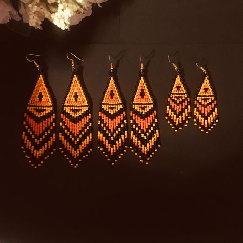 "These black orange fringed earrings pair amazingly with any outfit, dressy or casual. Colors: black orange long earrings Length: 4,5 inches (11,5 cm) Width: 1,2 inches (3 cm) medium earrings Length: 4,3 inches (11 cm) Width: 1 inches (2,5 cm) short earrings earrings Length: 3 inches (7,5 cm) Width: 0.8 inches (2,1 cm) Materials: Czech \"Preciosa\" beads Durable synthetic thread" Orange Fringe Earrings, Orange Seed Bead Earrings, Orange Beaded Earrings, Fall Seed Bead Earrings, Native American Beadwork Earrings, Fringe Bead Earrings, Fringed Earrings, Beaded Peacock, Short Earrings