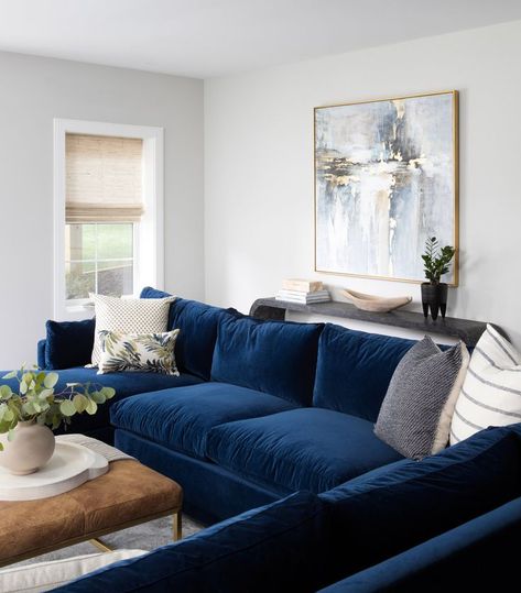 Created by @ashamaiadesign and captured by @jennverrierphoto, this luscious blue lounge feels like the perfect place to jumpstart the year. A sapphire blue velvet Sylvie Sectional Sofa adds verve to this space. 💙 Velvet Navy Sofa Living Room, Midnight Blue Sofa Living Room, Navy Blue L Shape Sofa Living Room, Blue Velvet Sofa With Chaise, Navy Blue Leather Sectional Sofa, Navy Beige Living Room Decor, Blue Velvet Sofa Living Room Bohemian, Dark Blue Velvet Sofa Living Rooms, Navy L Shaped Sofa