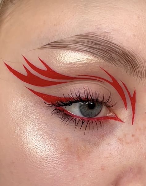 Fire Makeup Ideas, Edgy Graphic Liner, Fire Graphic Liner, Fire Inspired Makeup Look, Orange Make Up, Fire And Ice Makeup, Flame Eye Makeup, Flame Eyeliner, Red Graphic Eyeliner