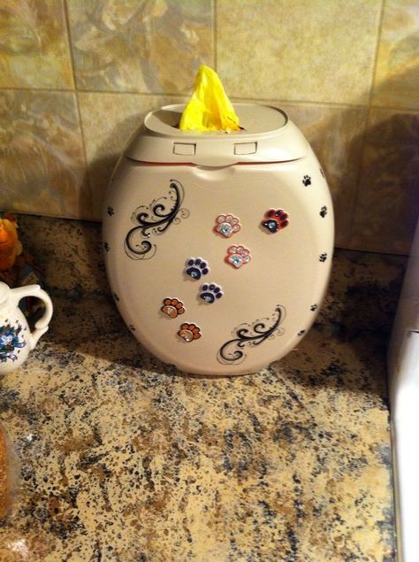 Tide Pod container spray painted, decorated and used for recycled grocery bags. Uses For Pod Containers, Reusing Tide Pod Containers, Reuse Tide Pods Container, Diy Tide Pod Containers Recycled, Tide Pod Container Reuse, Pod Container Crafts, Tide Pods Container Crafts, Laundry Bottles, Laundry Containers