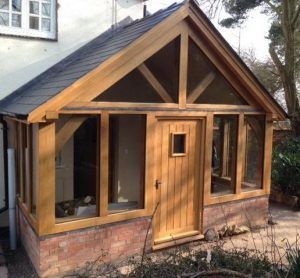 A large enclosed oak framed porch Screen Door Design, Exterior Transformations, Oak Porches, Porch Cottage, Japan Building, Enclosed Front Porches, Porch Extension, Sas Entree, Timber Frame Porch