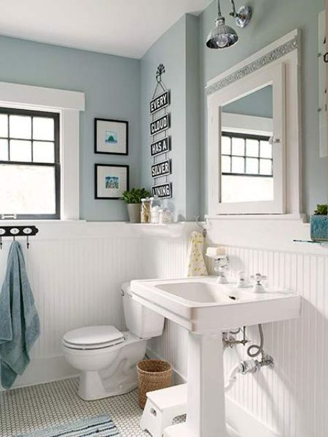 a cozy vintage farmhouse bathroom with light blue walls, white beadboard, a free standing sink, some art and much light Bathroom Wall Cladding, Blue Bathrooms, Bathroom Equipment, Light Blue Bathroom, White Wood Paneling, Architecture Unique, Blue Bathroom Decor, Bathroom Paint, Beige Bathroom