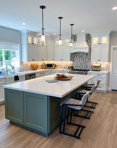 Sage green shaker style kitchen island with quartz countertops; overhang allowing for seating. Moss Green Island Kitchen, Green Accent Kitchen Island, Green Island With White Cabinets, Olive Green Island In Kitchen, Dark Green Kitchen Island White Cabinets, Hunter Green Kitchen Island, White Kitchen Sage Island, Different Color Kitchen Island, Dark Green Island Kitchen