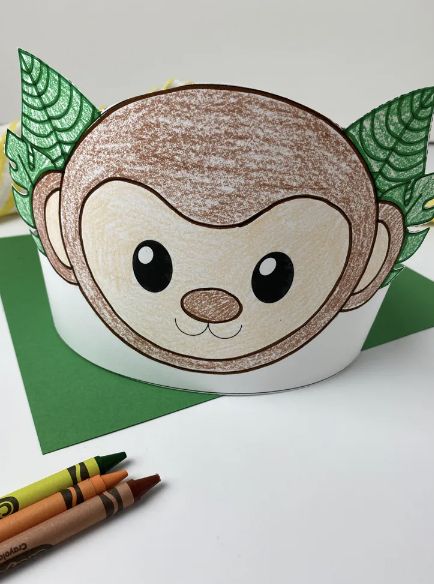 This printable monkey headband craft is the perfect craft to do with the kids. Whether planning a party, studying monkeys at school, or focusing on Ms, this animal headband craft is perfect. It is so easy to make that kids of all ages can do! By using cardstock, colored markers, scissors, glue, and a stapler, watch as your child's imagination takes off into the vines and trees! Be sure to check out our whole collection of headband crafts for kids for even more fun projects to do with the kids. Monkey Headband Craft, Monkey Crafts For Toddlers, Animal Headband Craft, Headband Crafts For Kids, Monkey Headband, Book Parade, Diy Toys Car, Play Preschool, Monkey Crafts