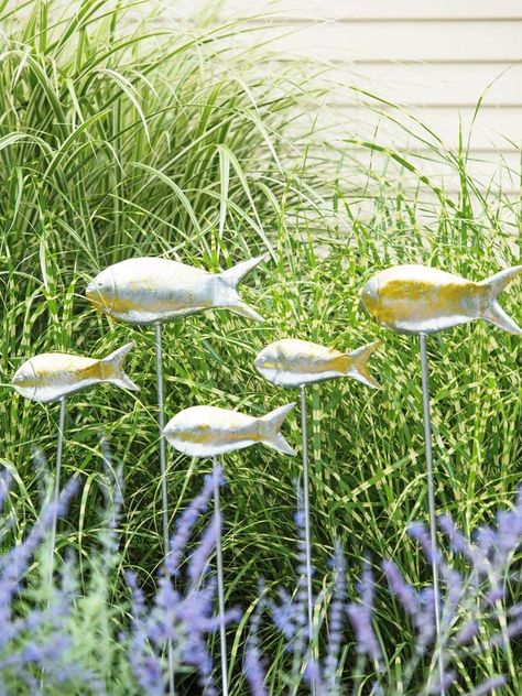 PRICES MAY VARY. STYLISH SWIMMERS- A whole school of fish to "swim" through perennials and ornamental grasses DOUBLE VIEW-Two-sided, so they're delightful when viewed from any angle INCLUDES- Set of 5, 2 large and 3 medium MATERIALS- Powder-coated steel, Weatherproof MEASUREMENTS- Large fish: 11-3/4" L x 40-1/4" H x 1" thick each, Medium fish: 8" L x 36" H x 1" thick each Gone fishing! Hovering above perennials or swimming through tall ornamental grasses, these fish are an unexpected and eye-cat Southern Gardening, Gardening Clipart, Gardening Business, Garden Cross, Gardening Services, Fish Out Of Water, Fish Garden, Decorative Garden Stakes, Raised Garden Beds Diy