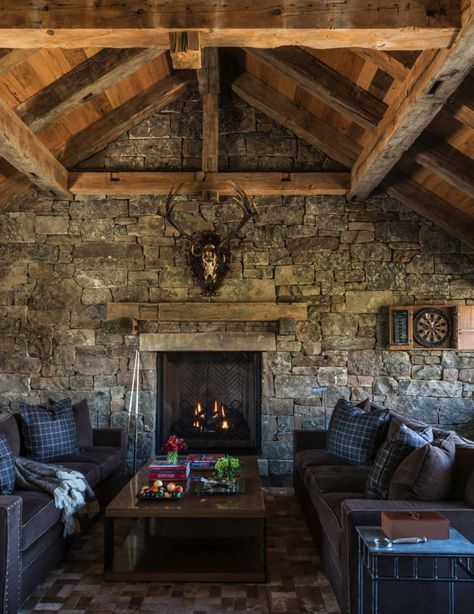 Ranch house features medieval-inspired craftsmanship in Jackson Hole Medieval Style Living Room, Medieval Modern Home, Medieval Inspired House Interior, Viking Living Room, Viking House Design, Medieval Living Room, Cabin Cabinets, Vikings House, Fancy Buildings