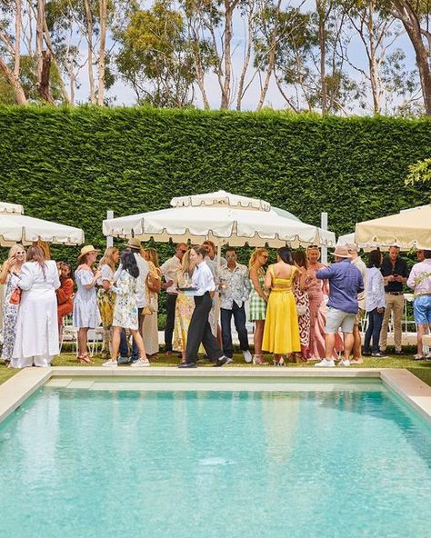 Tommy Collins on Instagram: "Envisioning a memorable summer soirée, @vicky_zaparas looked to Tommy Collins to bring the iconic poolside tableaus of Slim Aarons to life for a day. In their brightest retro-inspired attire, guests milled around a crystal blue pool shaded by pastel sun umbrellas from @danneventhire with midcentury lawn furniture to match. Vibrant tablescapes were arranged with flowers by @andrew_the_florist_ and @lemontreepaperco place settings, while @ashleyjamesonsax entertained Party Around Pool, Slim Aaron’s Party, Slim Aarons Pool Party, Slim Aarons Italy, Slim Aaron’s Wedding, Slim Aarons Wedding, Lemon Pool Party, Slim Aarons Aesthetic, Italian Umbrellas