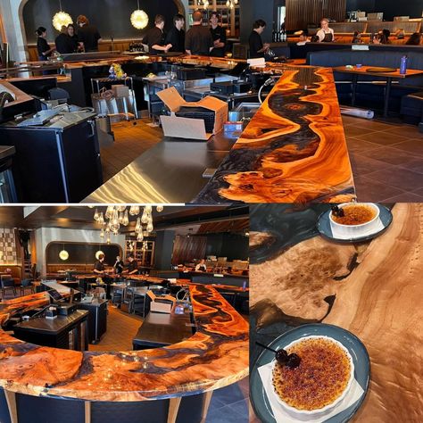 Are you looking to elevate the ambiance of your commercial space with a stunning and unique focal point? Look no further than TruWood Builders!  This is just one of the many commercial projects we have done.  This 70ft cottonwood river bar top was meticulously designed in collaboration with our client and handcrafted using over 150 gallons of high-quality resin. The result is a seamless blend of natural beauty and modern elegance that will captivate your customers and leave a lasting impression. This river bar top is not just furniture; it's a work of art. The natural grain patterns of the cottonwood wood combined with the flowing resin create a mesmerizing river-like effect that is truly one-of-a-kind. Your commercial space will exude sophistication and style with this striking centerpiec Interior Bar Design, Bar Top Epoxy, River Bar, Commercial Bar, Bar Interior Design, Wood Building, Restaurant Architecture, River Table, Bar Design Restaurant