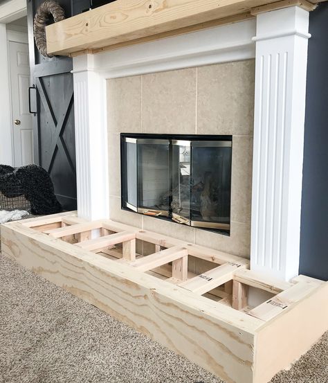 Is your fireplace dated and in need of a refresh? Check out this fireplace makeover. The before and afters are amazing!! Diy Fireplace Hearth, Hearth Pad, Fireplace Redo, Diy Fireplace Makeover, Fireplace Update, Build A Fireplace, Brick Fireplace Makeover, Farmhouse Fireplace, Young House Love