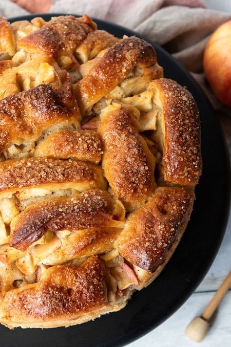 🍎🍯Harvest Apple Challah is a beautifully delicious challah that nods to many traditions of the Jewish holiday, Rosh Hashanah. 

To welcome in a sweet new year, apples and honey are served or incorporated into many recipes.  Honey is used to sweeten this challah and chopped apples are woven through the dough. 🍯 🍏

The round shape symbolizes the cycle of one year’s passing and the beginning of the next.🥮 Apple Cinnamon Pull Apart, Bread With Apples, Apple Challah, Cinnamon Pull Apart, Cinnamon Pull Apart Bread, Almond Bread, Scones Easy, Hot Bread, Best Bread Recipe