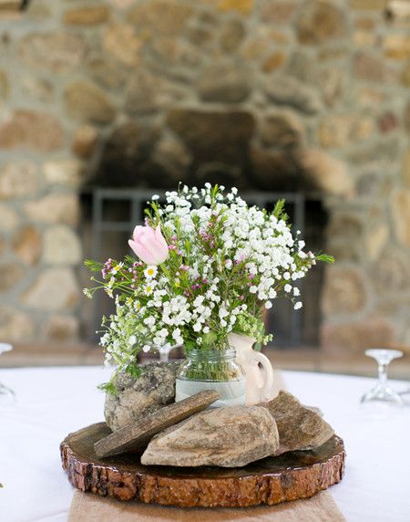 Beautiful baby’s breath centerpieces are great value for money and looks pretty.  Mix your baby’s breath with edgy accessories to match your wedding theme. Check it now! Centerpieces With Rocks, Park Wedding Reception, Spring Wedding Outfit, Garden Centerpiece, Summer Centerpieces, Rock Wedding, Tablescape Inspiration, Baby S Breath, Rustic Baby