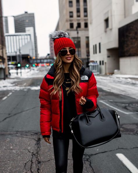 Fashion blogger mia mia mine wearing a red puffer jacket from north face with a givenchy antigona bag. To learn how to style a puffer jacket or to see more puffer jackets winter style, you can click through to my fashion blog Mia Mia Mine. I share various cute gym outfits, street style looks, pom pom beanies, casual winter outfits and more. #winterootd #fashion #style Red Puffer Jacket Outfit, North Face Puffer Jacket Outfit, Red North Face Jacket, North Face Jacket Outfit, Red Jacket Outfit, Winter White Outfit, The North Face Puffer Jacket, Puffer Jacket Outfit, Red Puffer Jacket