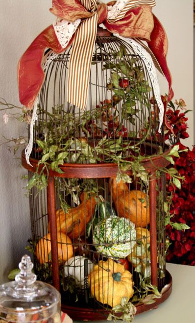 Fall table decoration - change out to ornaments or pomegranates & oranges for Christmas - Love it! Decorating With Picnic Baskets Ideas, Glam Pumpkins, Fall Patio, Pumpkins And Gourds, Vintage Fall Decor, Bird Cage Decor, Christmas Floral Arrangements, Fall Arrangements, Fall Deco