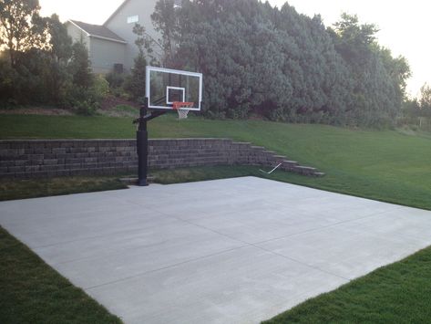 Pro Dunk stands solid, looks solid, and performs solid. Concrete Basketball Court Backyard, Concrete Basketball Court, Mini Mansion, Basketball Court Backyard, Backyard Basketball, Yard Inspiration, Hoops Basketball, Kids Backyard, Play Area Backyard