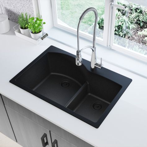 There’s nothing more classic than black and white. #QuartzClassic Narrow Kitchen Remodel, Top Mount Kitchen Sink, Clean Kitchen Sink, Composite Sink, Drop In Kitchen Sink, Apron Sink Kitchen, Black Sink, Quartz Kitchen, Single Bowl Sink