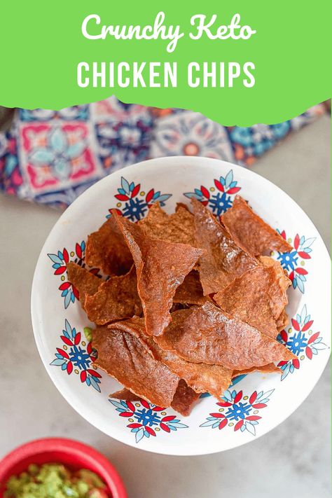 a plate of chicken chips with guacamole on the side Chicken Chips Recipe Keto, Chicken Chips Keto, Wilde Protein Chips, Chicken Chips Recipe, Keto Chicken Nuggets Canned Chicken, Protein Chips Homemade, Crunchy Keto Snacks, Protein Chips Recipe, Carnivore Chips