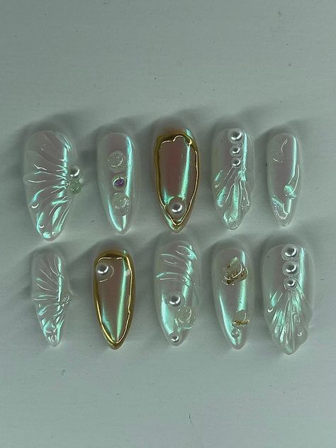 Beautiful Gel polish press on nails designed uniquely for you by me, *ANGELIC MERMAID NAIL SET* Promising you Top-notch quality and uniquely crafted art, These press-ons are sure to catch everyone's attention. These nails can be customized, designed and sized for you to your liking after purchase by emailing me at : shop.ultimatenails@gmail.com  Or messaging me on Etsy with any inspiration photos or requests you may have.   WHAT IS INCLUDED WITH THE NAIL KIT: These press-ons will come with everything you need to install them yourself, such as: - Disposable push-back  - Disposable File  -Disposable buffer  -Nail glue  -alcohol wipes  -My 24/7 support to ensure a smooth process  Save yourself and your loved ones time and money while in the comfort of your own home while having fun! These nai Mermaid Press On Nails, Long Round Nail Designs, Custom Press Ons, Cute Nail Sets, Mermaid Nails Design, Press On Nails With Charms, Siren Nails, Press On Nails Design, Press On Nail Designs