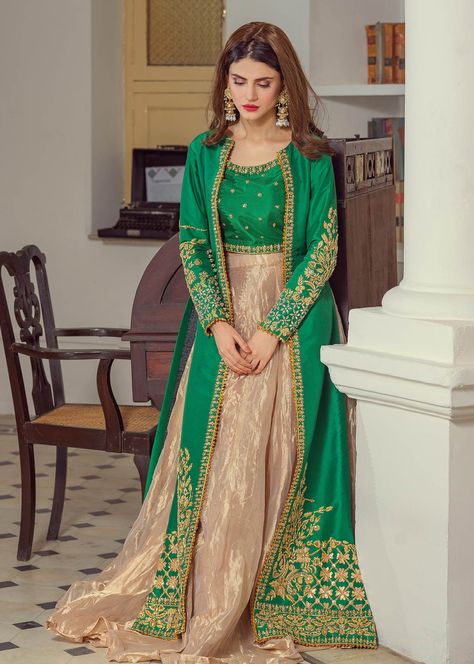 Color: Green Fabric: rawsilk Description: Beautiful rawsilk jacket with crushed gold lengha underneath and a matching crop top. It is a 3 piece outfit. Includes: Jacket Lehenga Crop Top Delivery time: Will be delivered in 1-2 months. Lengha With Jacket, Garara Designs Pakistani Dresses, New Gown Design, Haris Shakeel, Gold Lengha, Latest Gown Designs, Beautiful Gown Designs, Jacket Lehenga