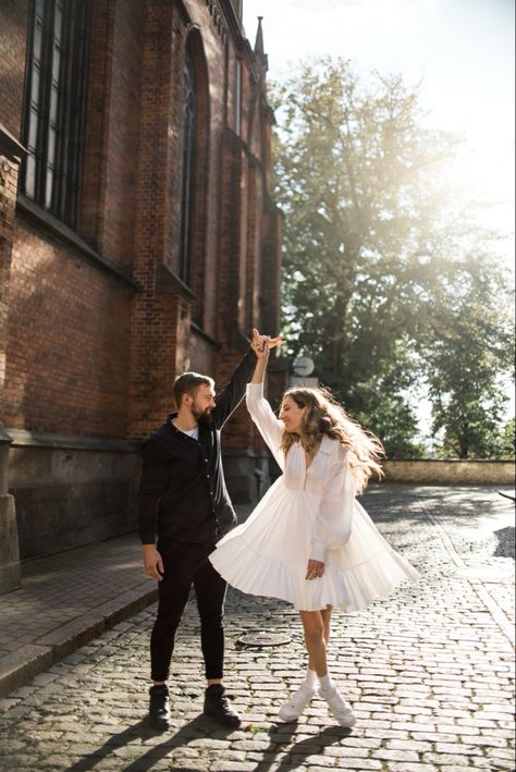 Dresses For Prewedding Photoshoot, Couple In White Outfit, Couple Poses With Dress, Urban Pre Wedding Photoshoot, Engagement Photos With Sneakers, Wedding Casual Photoshoot, Urban Couple Photoshoot Outfit, Couple Spinning Around, Couple Poses Dress