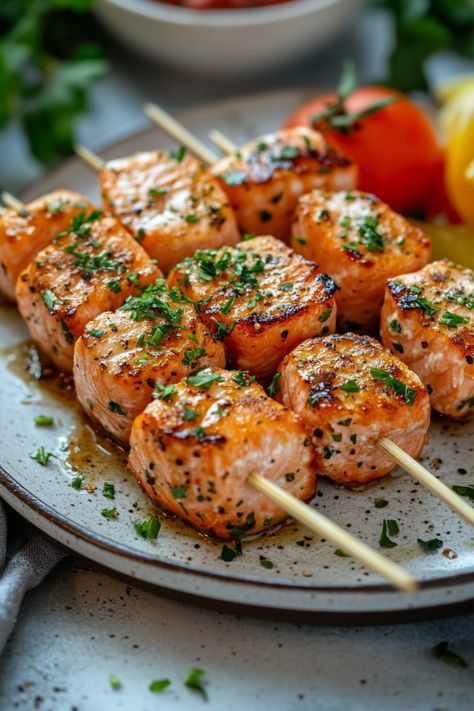 Grilled salmon skewers garnished with chopped herbs on a plate. Salmon Bites Bowl, Easy Healthy Salmon, Salmon Bites Recipe, Recipe For Air Fryer, Steak Bites Recipe, Air Fryer Salmon, Salmon Bites, Decadent Food, Recovery Food