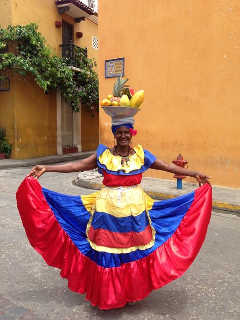 Street vendor in Old Town Cartagena, Colombia displaying the country's flag colors in all its glory! Colombian Dance, Colombian Flag, Colombian Culture, Charity Event, Latin American, Flag Colors, Dance Art, Places Around The World, Cuba